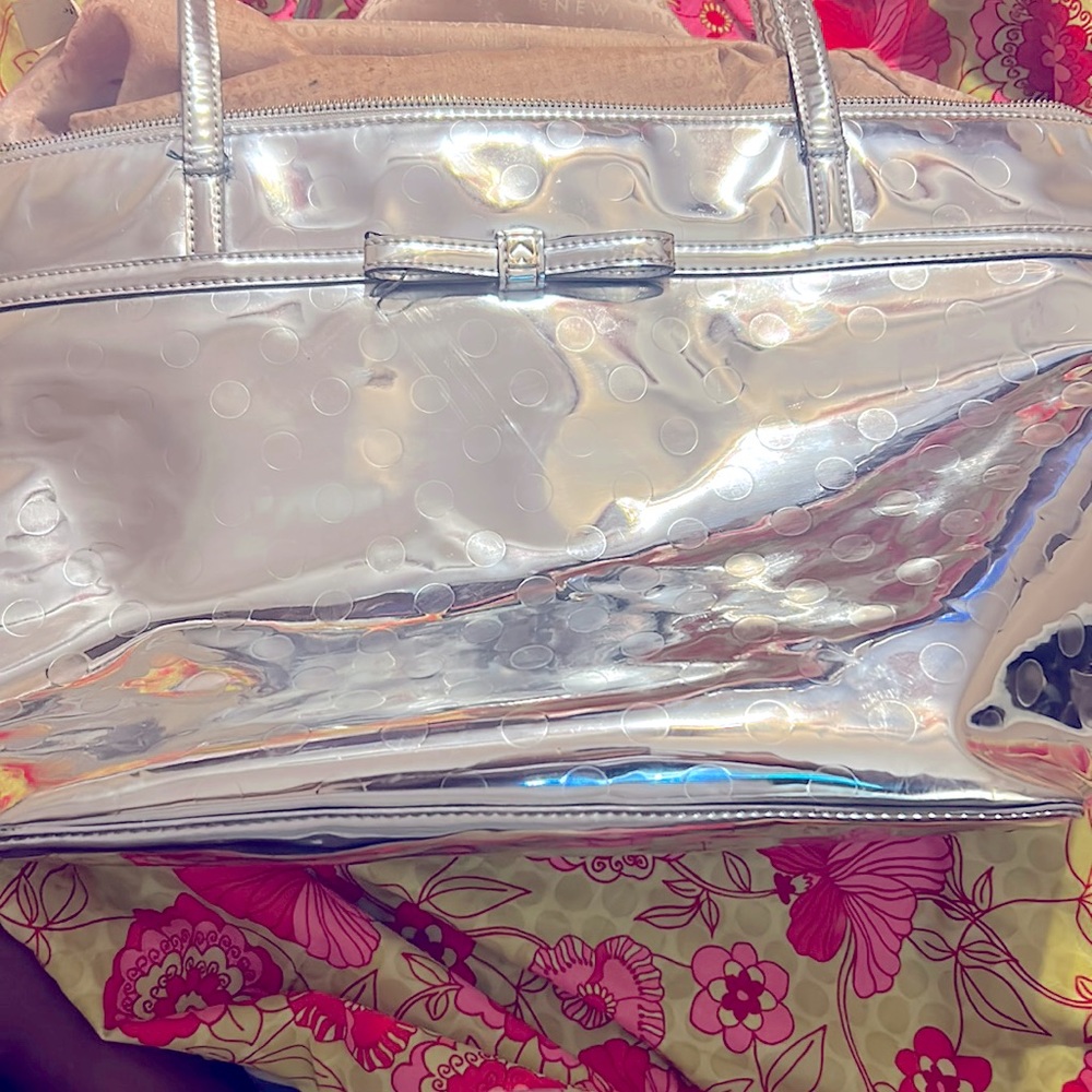 Authentic Kate Spade handbag metallic and beautiful.